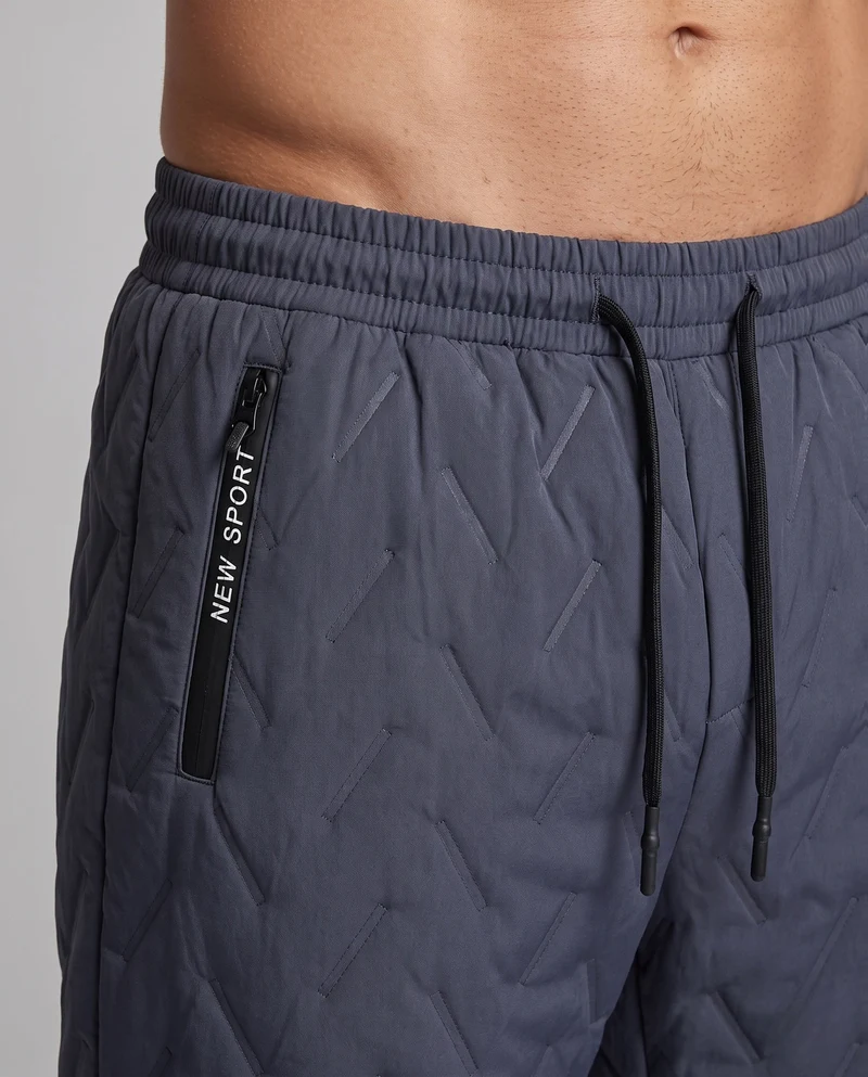 Herren wattierte Thermo-Jogginghose mit gesteppter Oberfläche, elastischem Kordelbund & Reißverschlusstaschen Nord Taschen