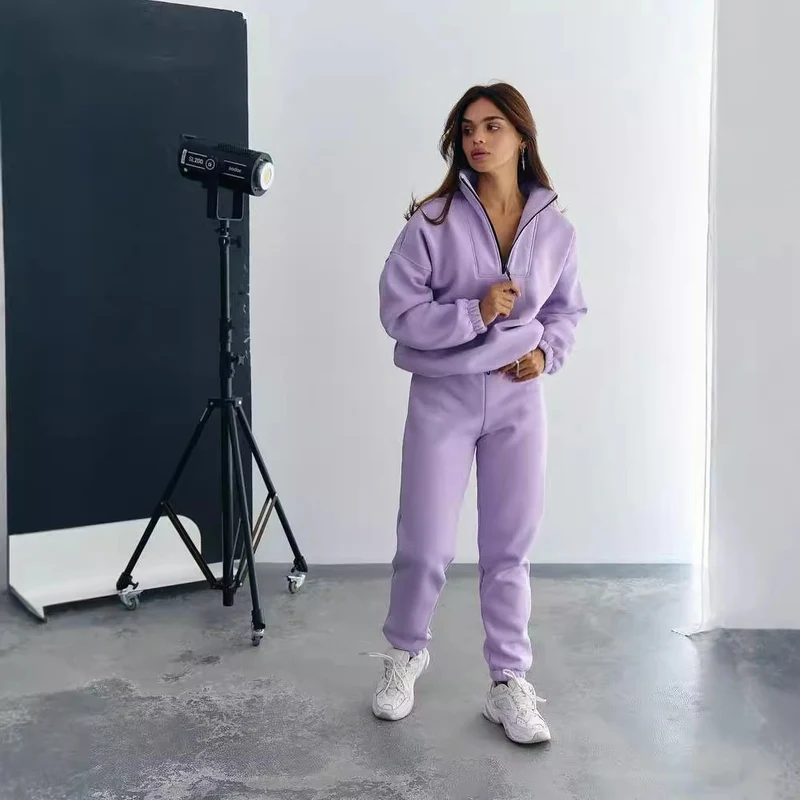 Damen Athleisure-Zweiteiler aus dickem French-Terry mit hohem Stehkragen, halbem Reißverschluss und Tunnelzughose Nord Taschen
