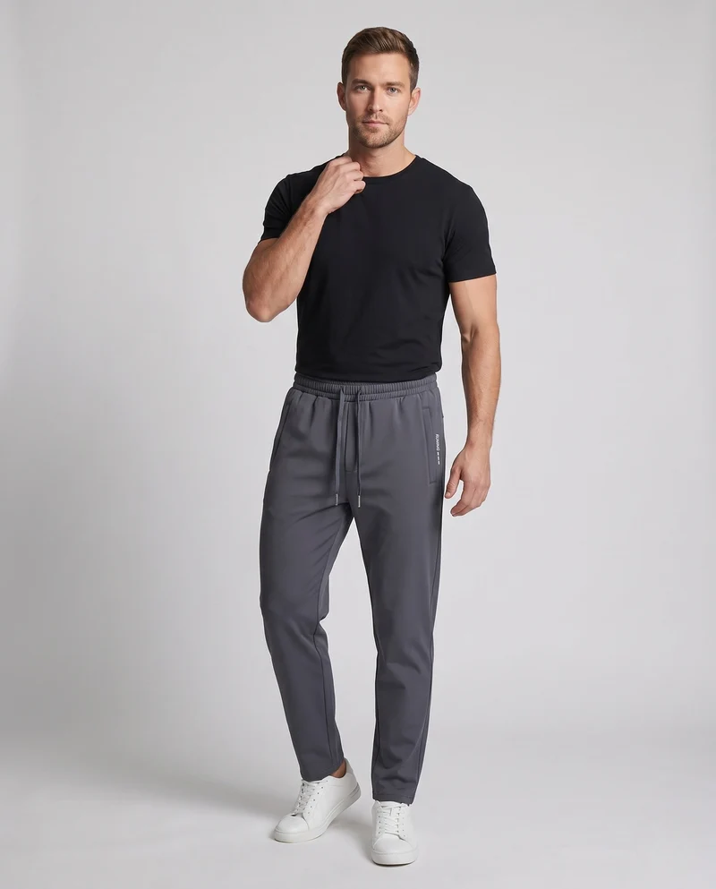 Herren Tapered Funktions-Jogginghose mit Tunnelzug, Reißverschlusstaschen und Knöchelreißverschluss Nord Taschen