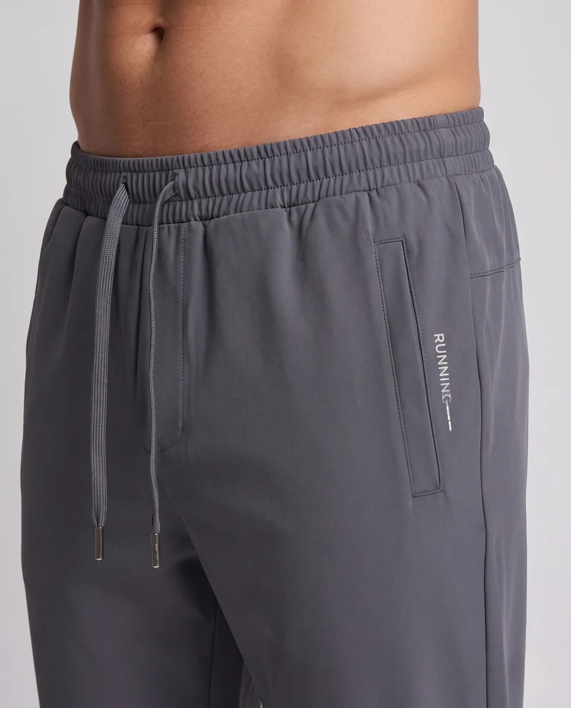 Herren Tapered Funktions-Jogginghose mit Tunnelzug, Reißverschlusstaschen und Knöchelreißverschluss Nord Taschen