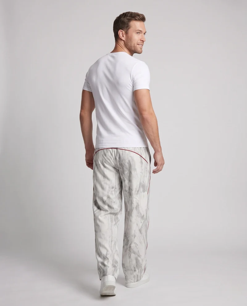 Unisex Weite Trackhose im Marmor-Look mit Tunnelzugbund & verstellbarem Saum
