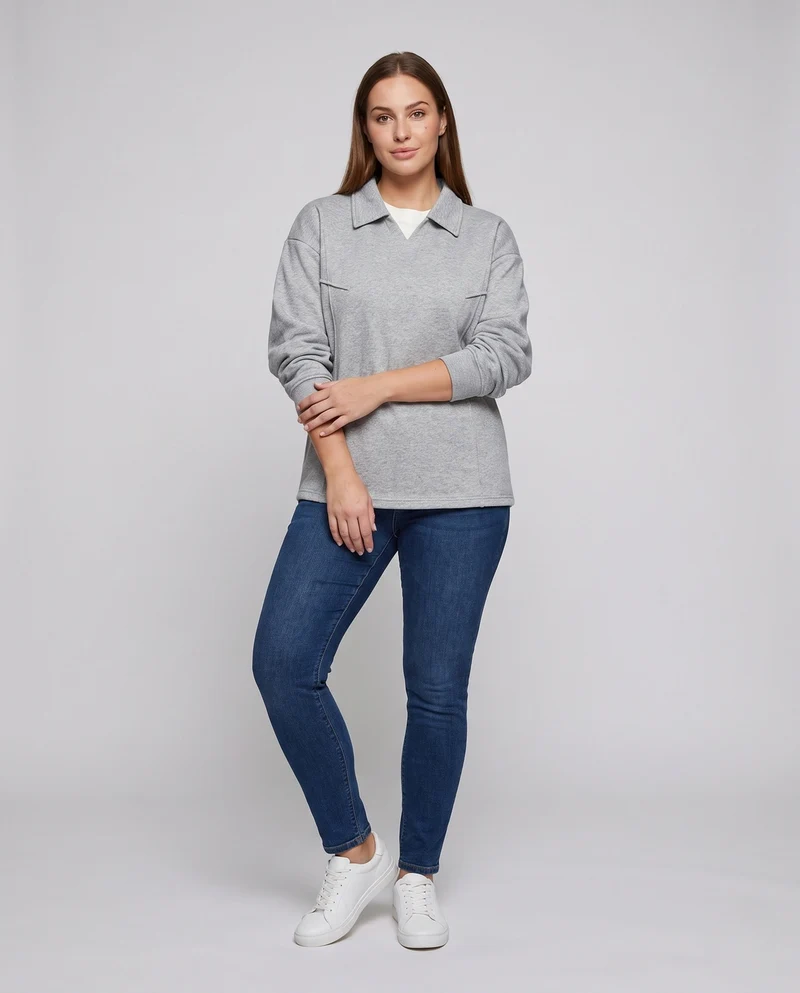 Unisex Oversize-Sweatshirt mit Hemdkragen und abgerundetem Saum