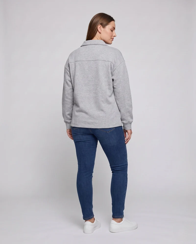 Unisex Oversize-Sweatshirt mit Hemdkragen und abgerundetem Saum