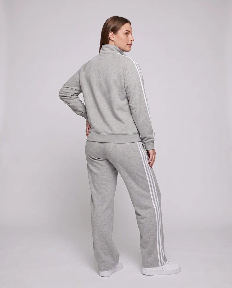 Unisex Oversize-Trainingsset aus French-Terry mit Halbzip, Raglanärmeln & weiten Seitenstreifen-Jogginghose