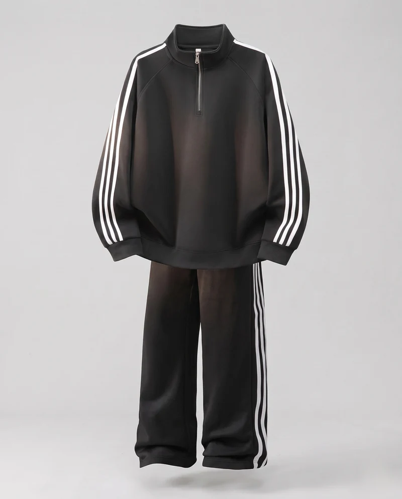 Unisex Oversize-Trainingsset aus French-Terry mit Halbzip, Raglanärmeln & weiten Seitenstreifen-Jogginghose