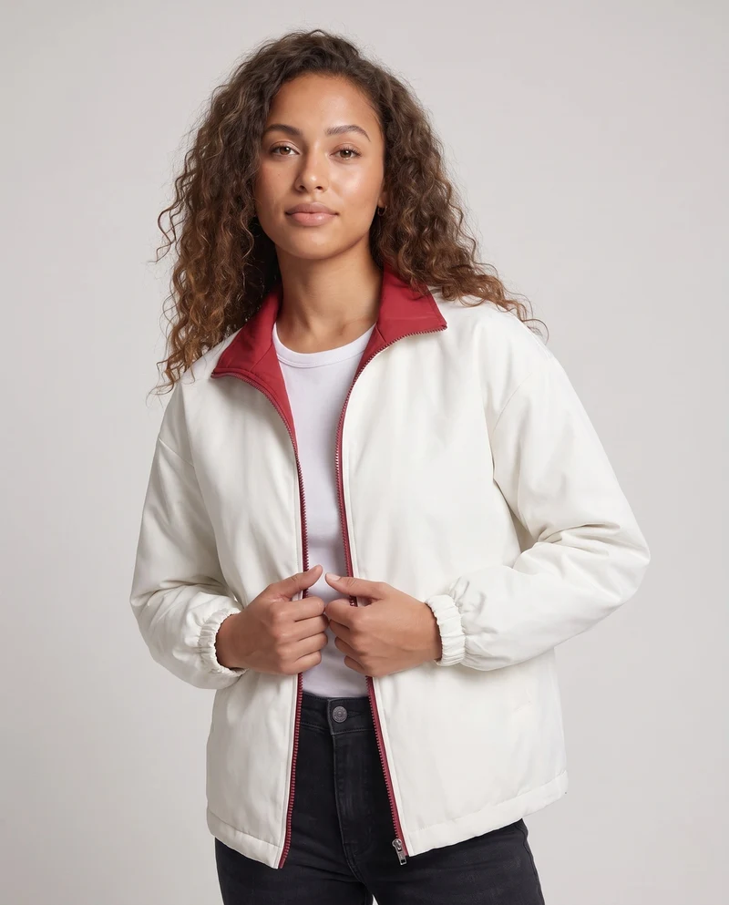 Unisex Wendewindjacke mit hochschließendem Kragen, Reißverschluss & elastischen Bündchen