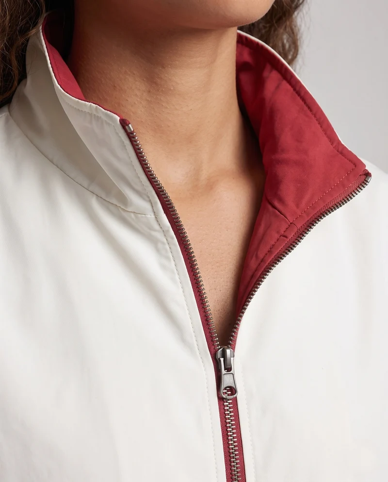 Unisex Wendewindjacke mit hochschließendem Kragen, Reißverschluss & elastischen Bündchen