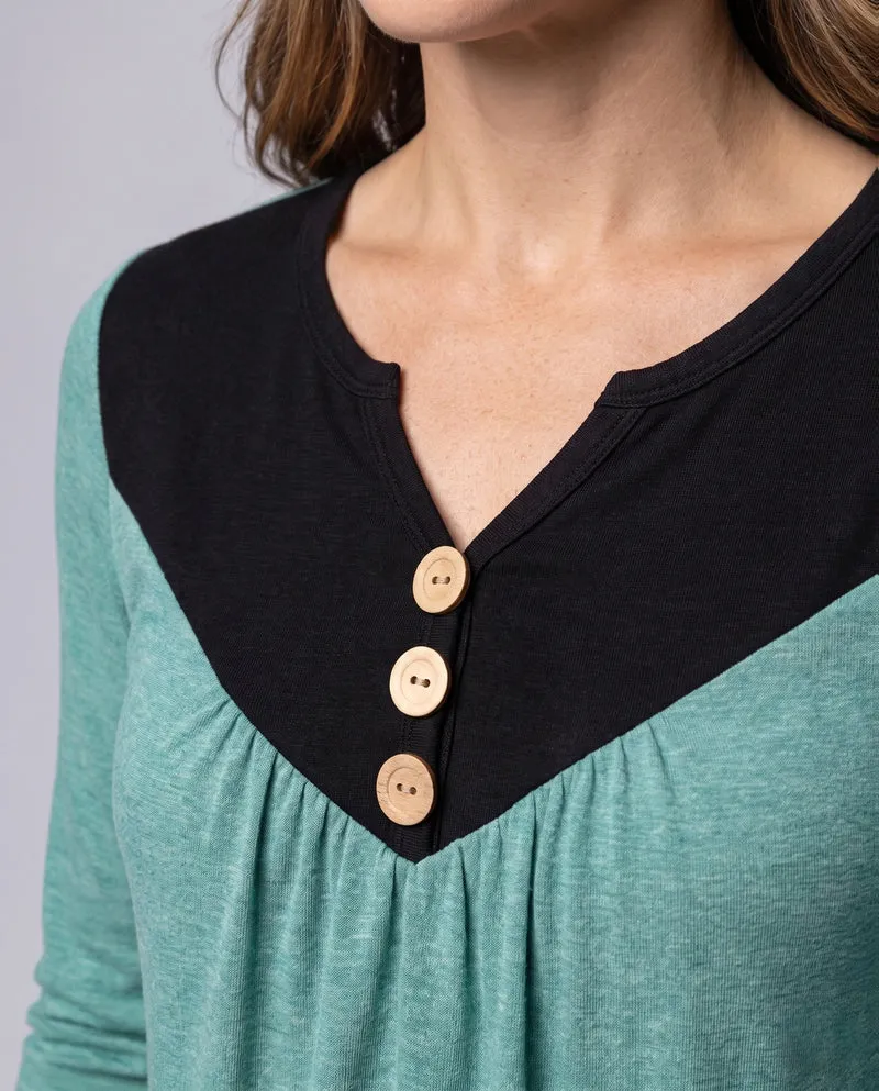 Damen Lockeres V-Ausschnitt Tunika Langarmshirt mit Kontrastpasse und Dekorativen Knöpfen Nord Taschen