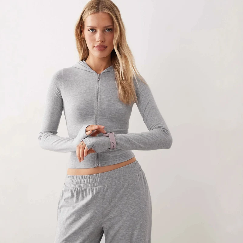 Damen Zweiteiliges Loungewear-Set geripptes Crop-Kapuzenoberteil mit Reißverschluss und Daumenloch sowie weiter Jogginghose Nord Taschen