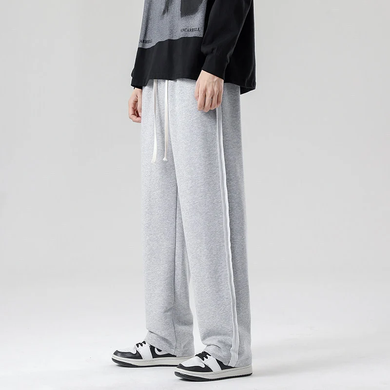 Herren weite Jogginghose im Oversize-Schnitt mit Seitenstreifen, Kordelzug & Fleecefutter Nord Taschen