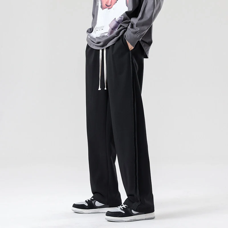 Herren weite Jogginghose im Oversize-Schnitt mit Seitenstreifen, Kordelzug & Fleecefutter Nord Taschen