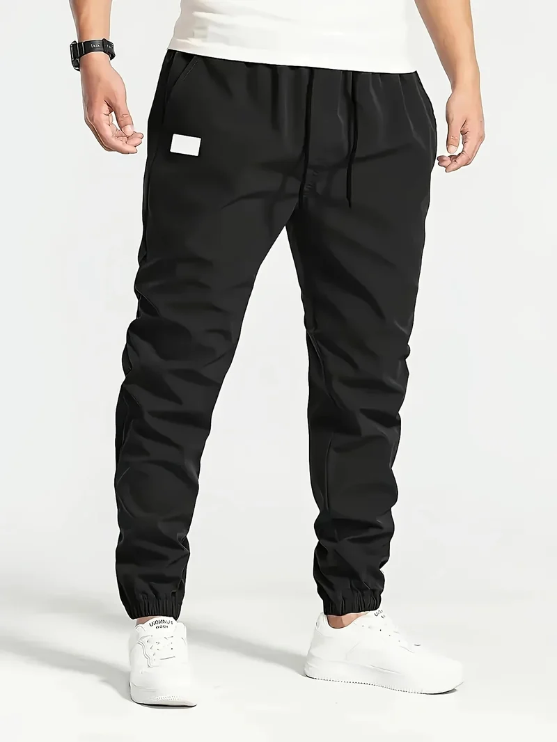 Herren Technische Jogginghose im Tapered‑Utility‑Stil mit elastischem Bund & Knöchelbündchen Nord Taschen