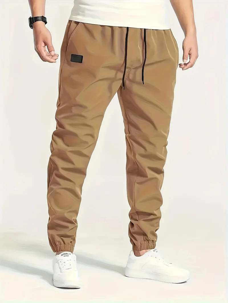 Herren Technische Jogginghose im Tapered‑Utility‑Stil mit elastischem Bund & Knöchelbündchen Nord Taschen