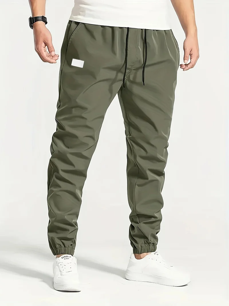 Herren Technische Jogginghose im Tapered‑Utility‑Stil mit elastischem Bund & Knöchelbündchen Nord Taschen