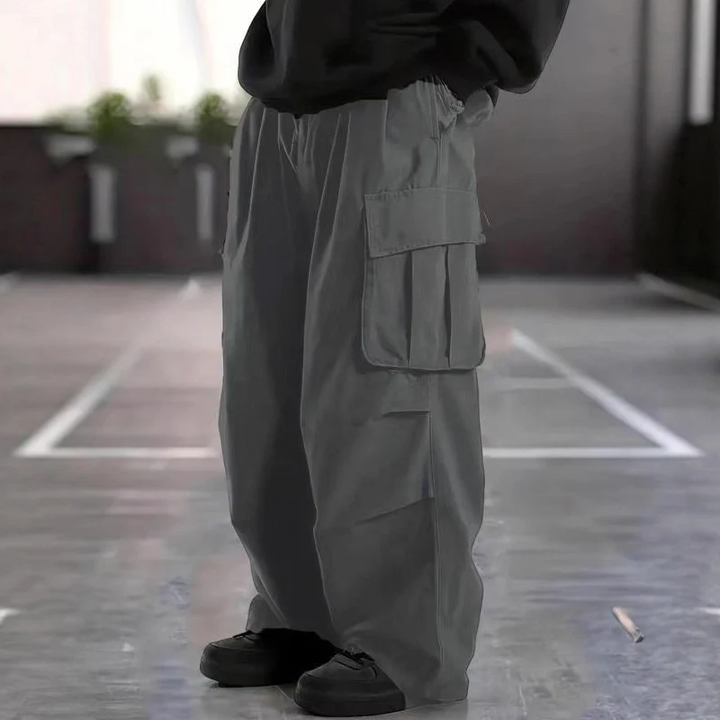 Herren Oversize-Baggy-Cargohose im Urban-Utility-Stil mit elastischem Tunnelzugbund und Mehrfachklappentaschen Nord Taschen