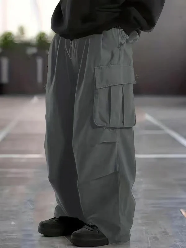 Herren Oversize-Baggy-Cargohose im Urban-Utility-Stil mit elastischem Tunnelzugbund und Mehrfachklappentaschen Nord Taschen