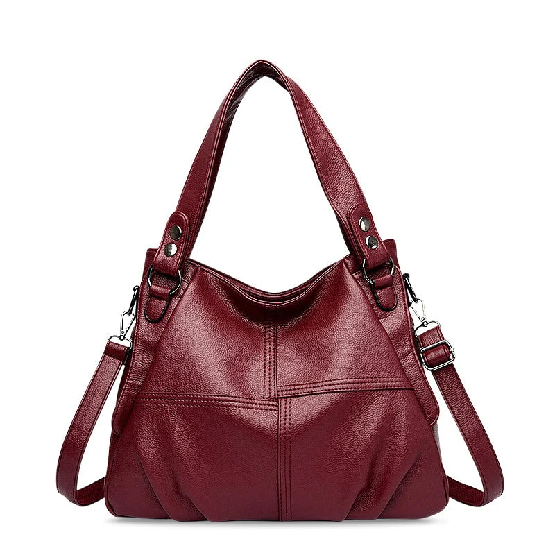 Nord Taschen | Große vegane Kuhfell-Hobo-Schultertasche