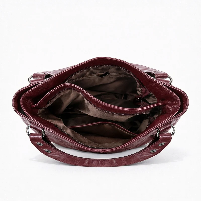 Nord Taschen | Große vegane Kuhfell-Hobo-Schultertasche