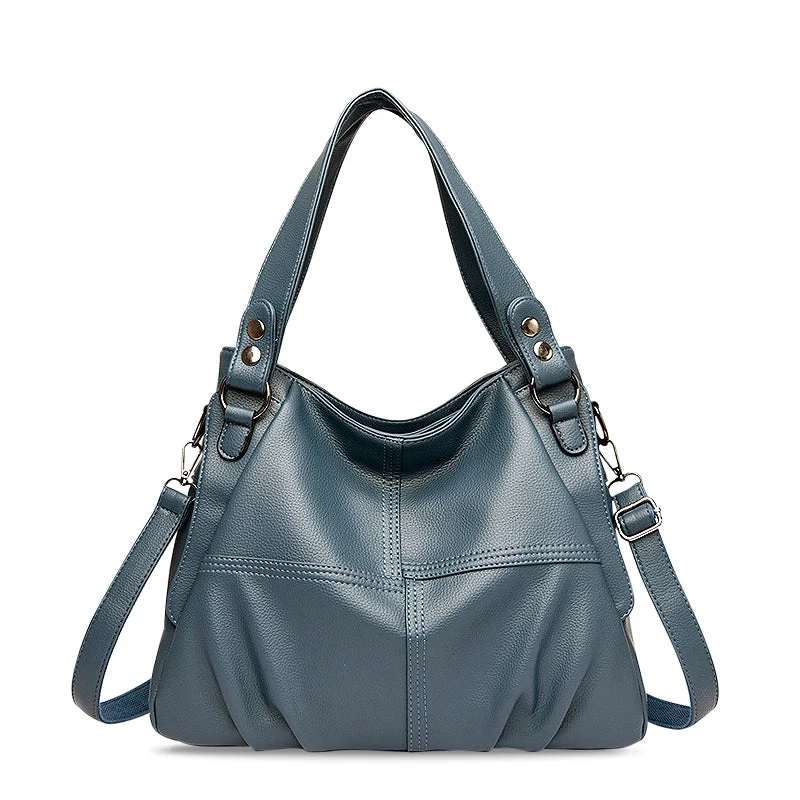 Nord Taschen | Große vegane Kuhfell-Hobo-Schultertasche