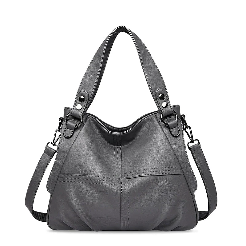 Nord Taschen | Große vegane Kuhfell-Hobo-Schultertasche