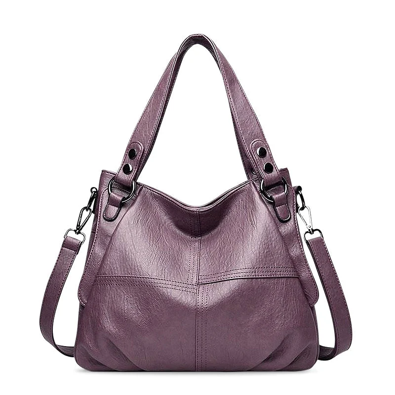 Nord Taschen | Große vegane Kuhfell-Hobo-Schultertasche