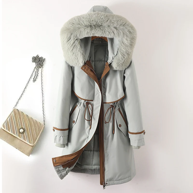 Damen nan langer Parka mit Kunstfellkapuze Taillenzug und kontrastierten Paspeln Nord Taschen