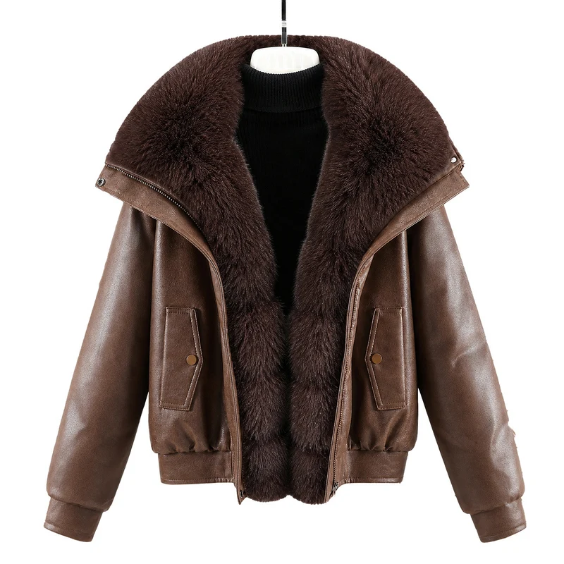Damen nan kurze Lammfelloptik-Bomberjacke mit voluminösem Fellkragen und tailliertem Saum Nord Taschen