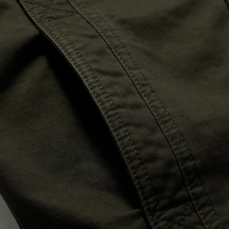 Herren Urbaner Canvas‑Militärblouson mit hohem Kragen, Schulterepauletten und Multifunktions‑Taschen Nord Taschen
