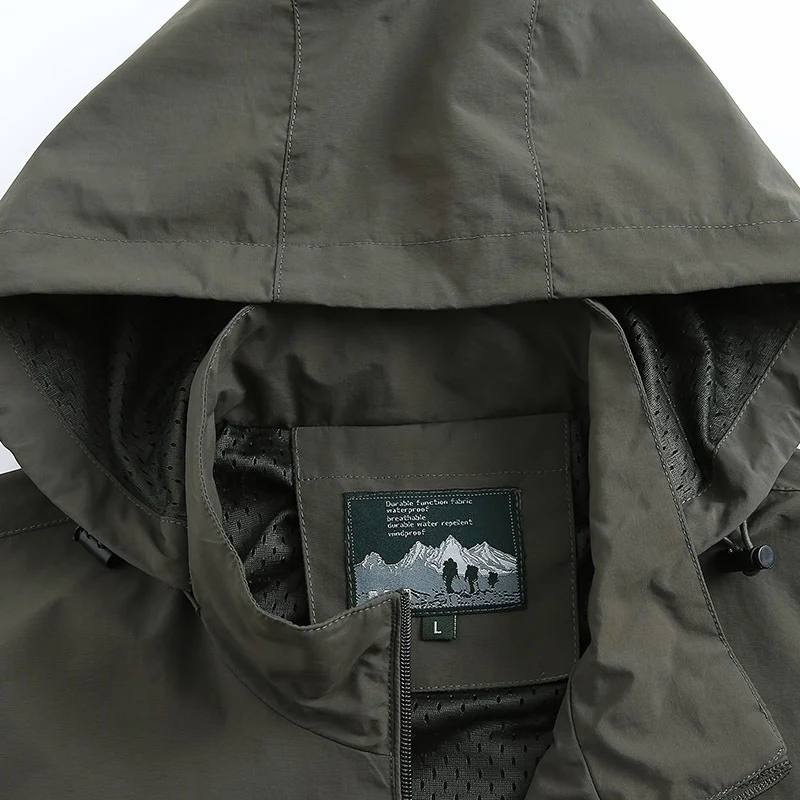 Herren leichte wind- und wasserabweisende Softshelljacke mit Kapuze, Brustreißverschluss und verstellbaren Ärmelabschlüssen Nord Taschen