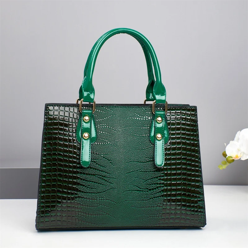 Damen elegante Handtasche mit schicker Schleifenapplikation und edlem Krokodil-Look Nord Taschen