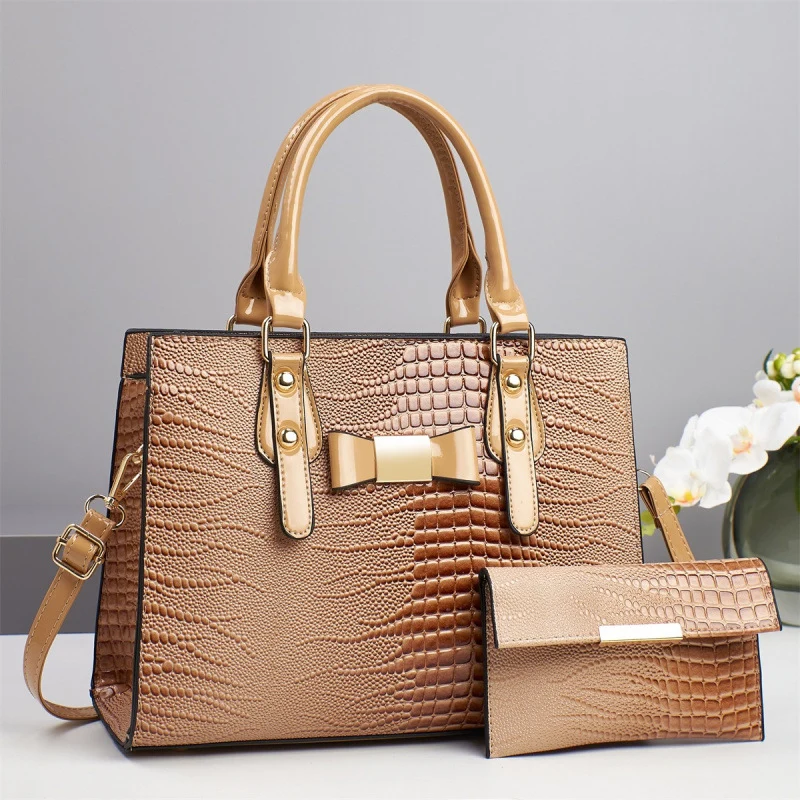 Damen elegante Handtasche mit schicker Schleifenapplikation und edlem Krokodil-Look Nord Taschen