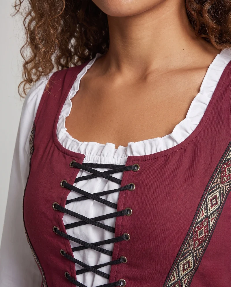 Frauen traditionelle Kleid mit dekorativer Schnürung und bunten Stickdetails Nord Taschen