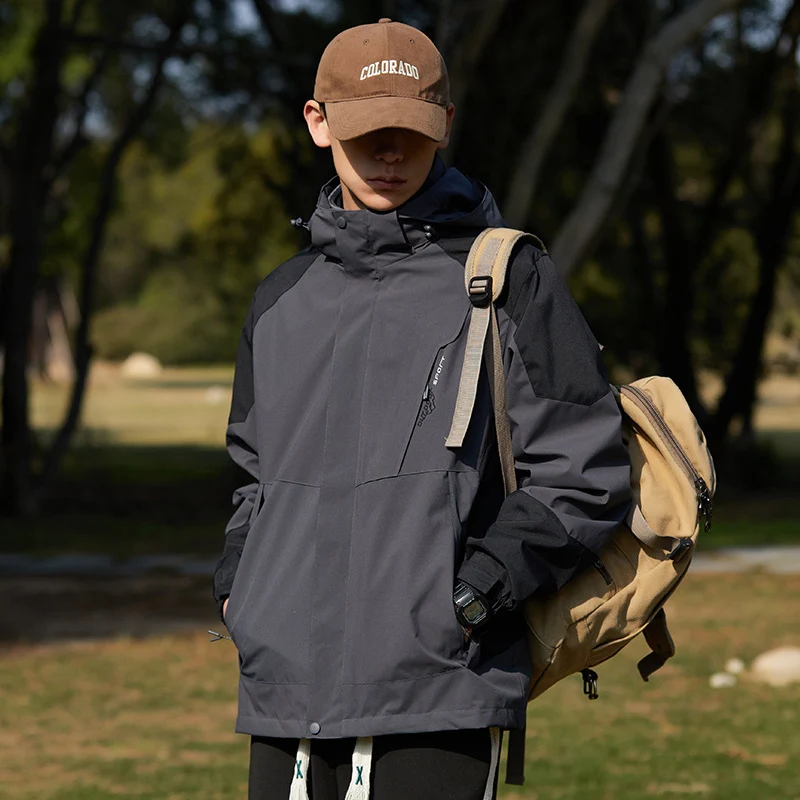 Damen zweilagige wasserabweisende Outdoorjacke mit Kapuze, Taillenregulierung und Kontrastbesätzen Nord Taschen