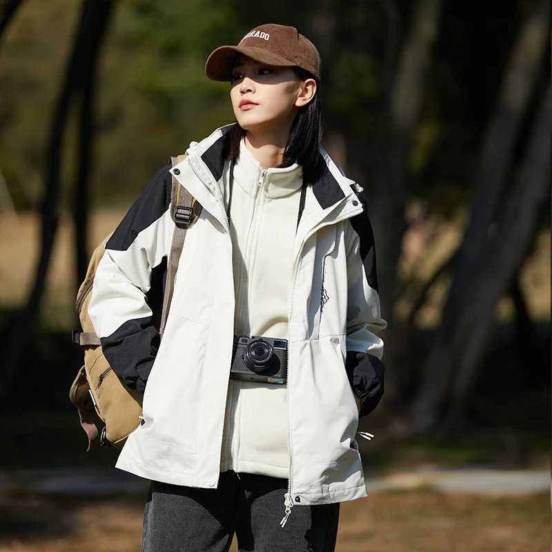 Damen zweilagige wasserabweisende Outdoorjacke mit Kapuze, Taillenregulierung und Kontrastbesätzen Nord Taschen