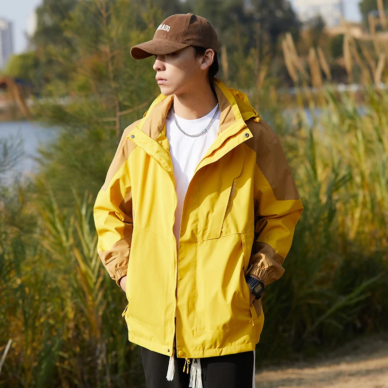 Damen zweilagige wasserabweisende Outdoorjacke mit Kapuze, Taillenregulierung und Kontrastbesätzen Nord Taschen