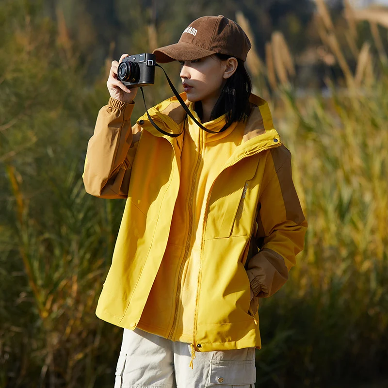 Damen zweilagige wasserabweisende Outdoorjacke mit Kapuze, Taillenregulierung und Kontrastbesätzen Nord Taschen