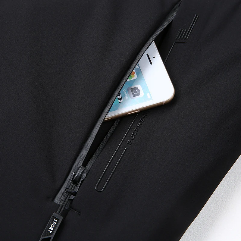 Herren Wind- und Wasserabweisende Softshell-Jacke mit Kapuze und leichtem Thermofutter Nord Taschen