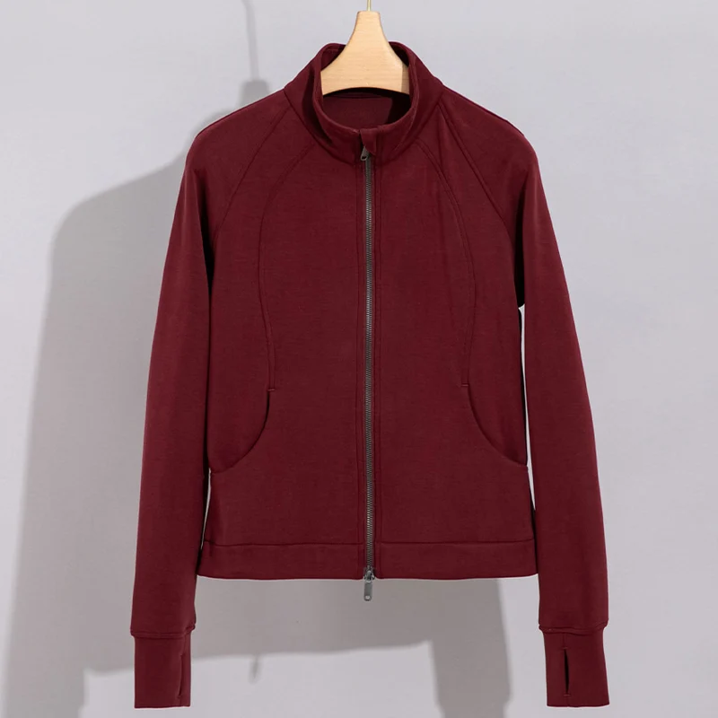 Damen Performance-Trainingsjacke mit Stehkragen und Daumenloch Nord Taschen