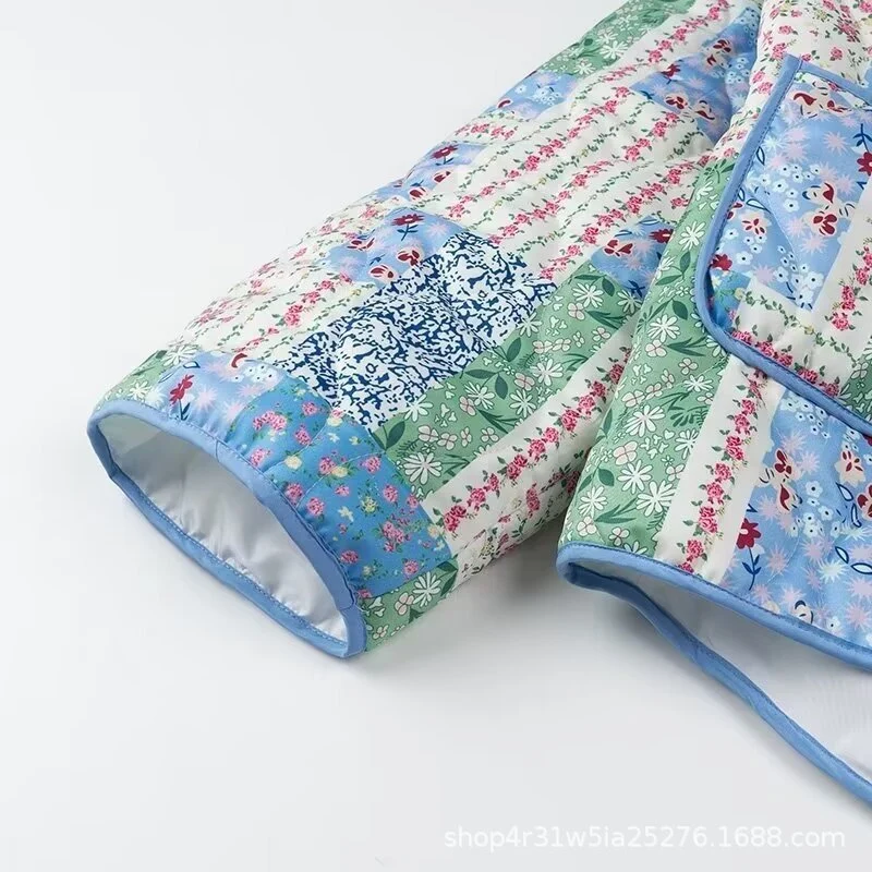 Damen Steppjacke im Patchwork-Quiltstil mit Schalkragen und aufgesetzten Taschen Nord Taschen