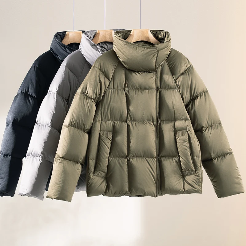 Damen Kurze Boxy-Pufferjacke mit hohem Stehkragen und Raglanärmeln Nord Taschen