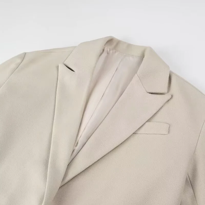 Damen Langmantel mit langem Fransen‑Saum, kastiger Oversize‑Silhouette und Reverskragen Nord Taschen