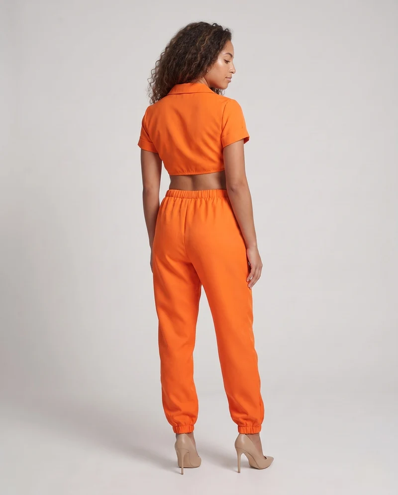 Damen Kostümset im Gefängnisstil mit kurzem Oberteil und Bundhose Nord Taschen