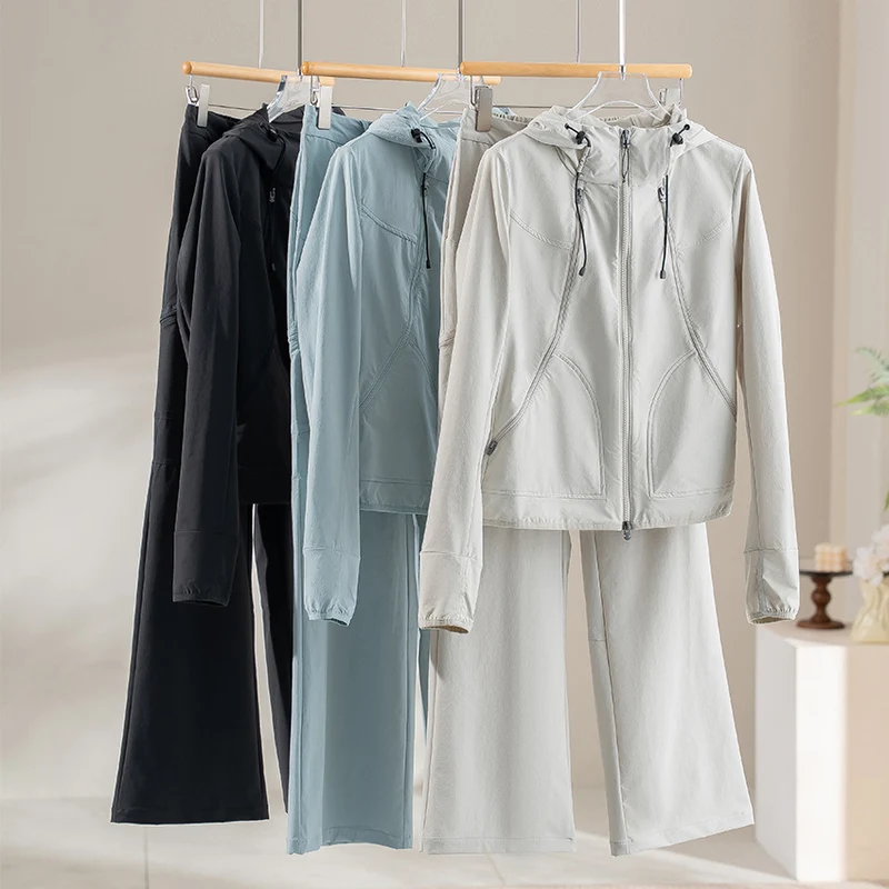 Damen Ultraleichter Kapuzen-Windbreaker mit Zwei-Wege‑Reißverschluss Nord Taschen