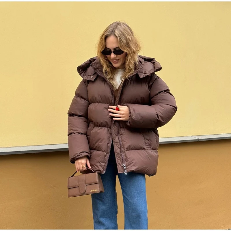Damen Gefütterte Oversize-Steppjacke mit Volumenärmeln und abnehmbarem Kapuzenkragen Nord Taschen