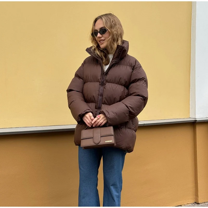 Damen Gefütterte Oversize-Steppjacke mit Volumenärmeln und abnehmbarem Kapuzenkragen Nord Taschen