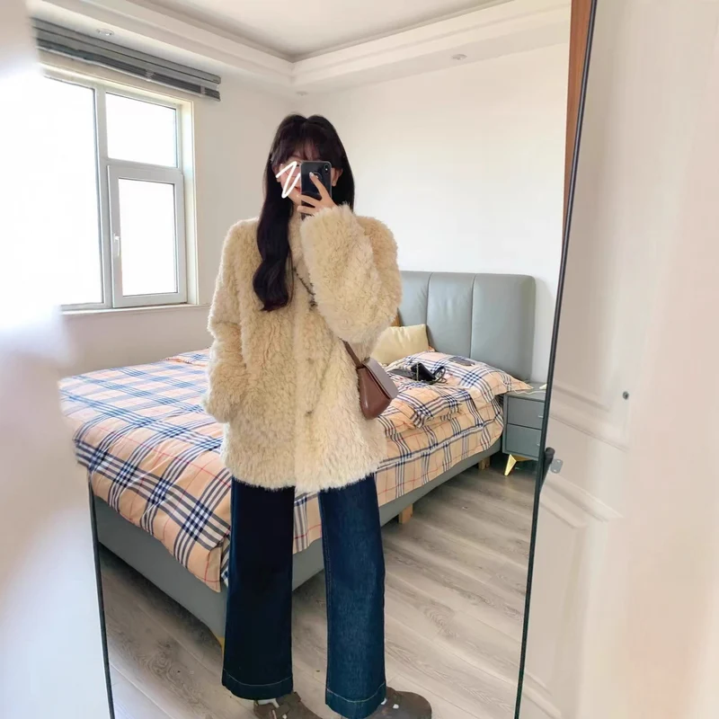 Damen Teddy-Mantel aus Kunstfell mit Oversize-Schnitt und Eingrifftaschen Nord Taschen