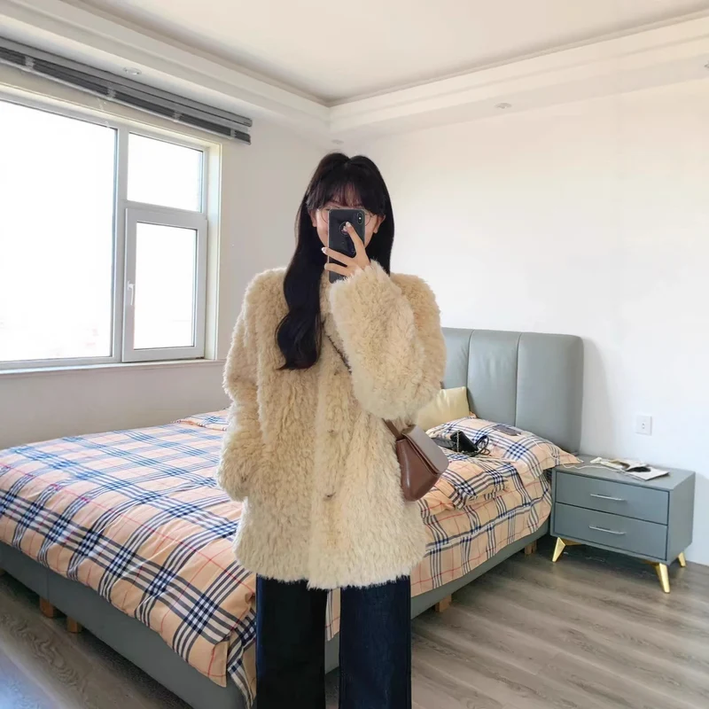 Damen Teddy-Mantel aus Kunstfell mit Oversize-Schnitt und Eingrifftaschen Nord Taschen