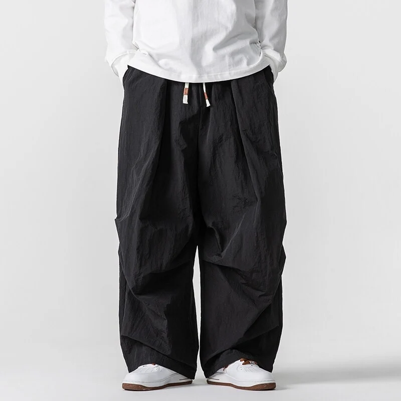 Herren Weite Utility-Loungehose mit überlappenden Falten und Kordelzugbund Nord Taschen
