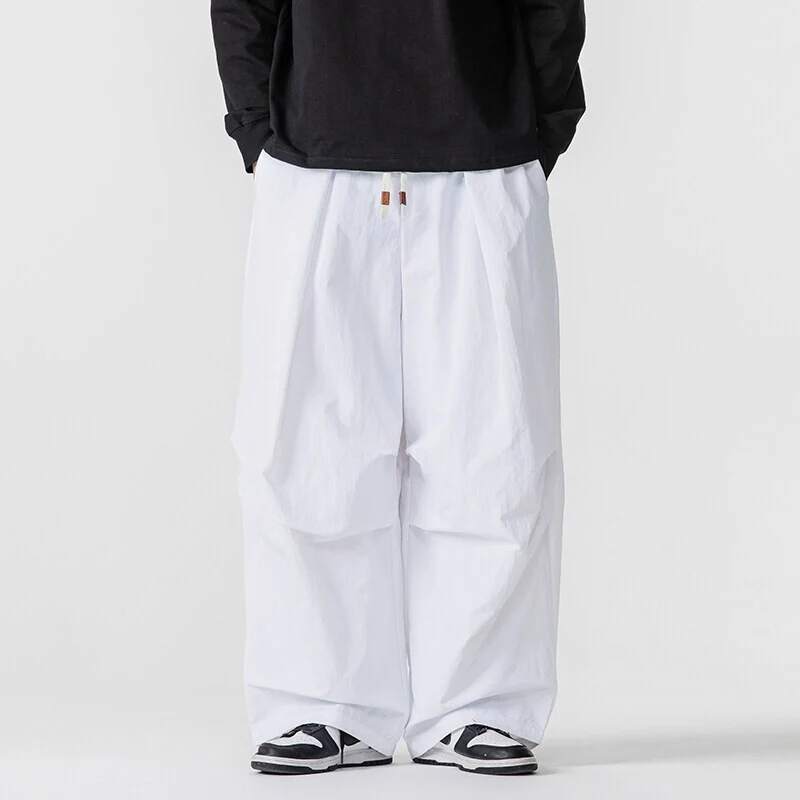 Herren Weite Utility-Loungehose mit überlappenden Falten und Kordelzugbund Nord Taschen