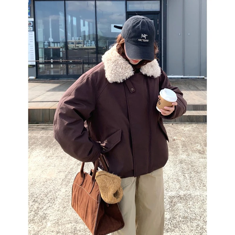 Damen Oversize-Kurzjacke mit Teddykragen und Pattentaschen Nord Taschen